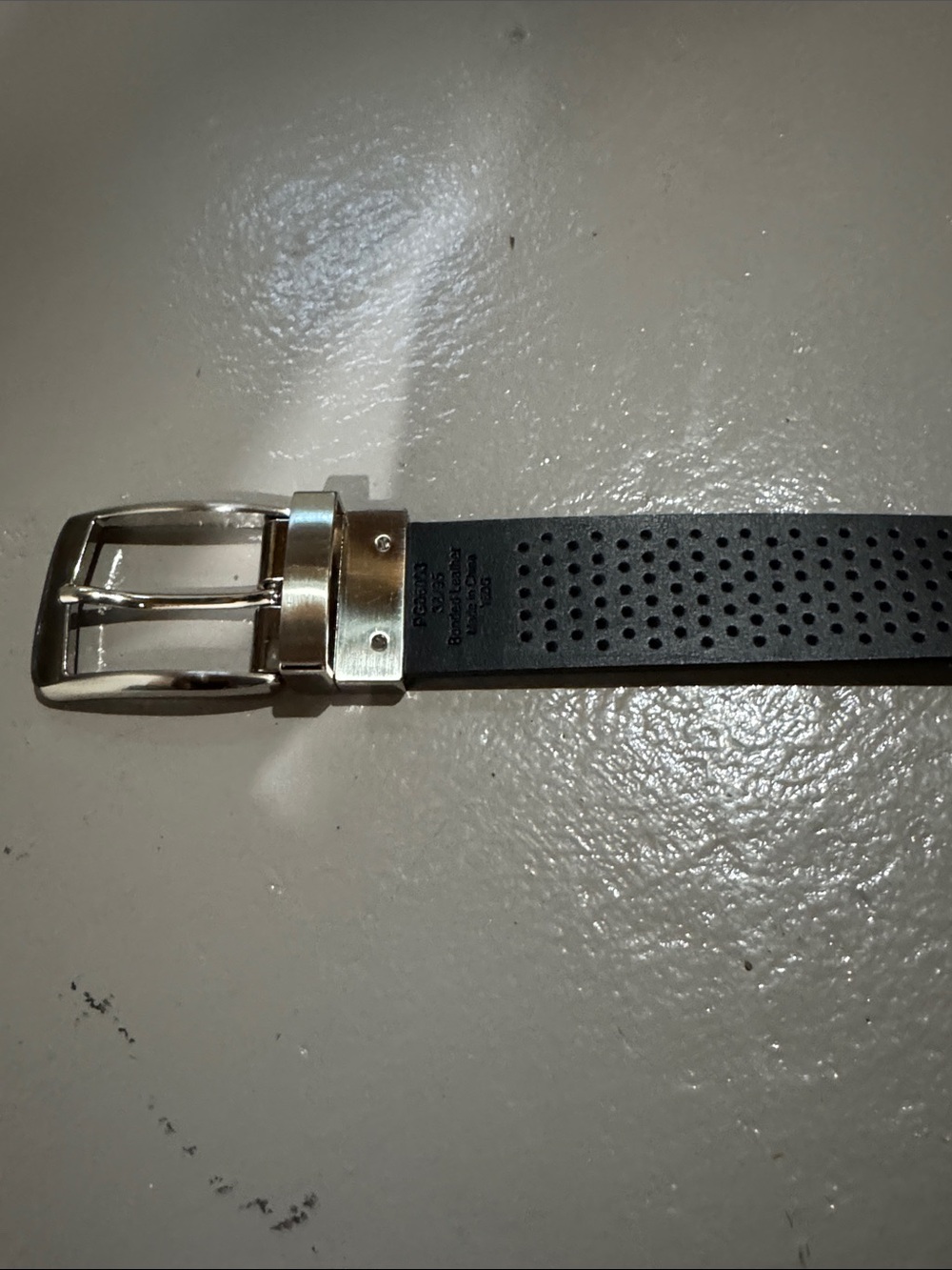 Men’s Reversible Perforated Black Leather Belt with Silver Buckle